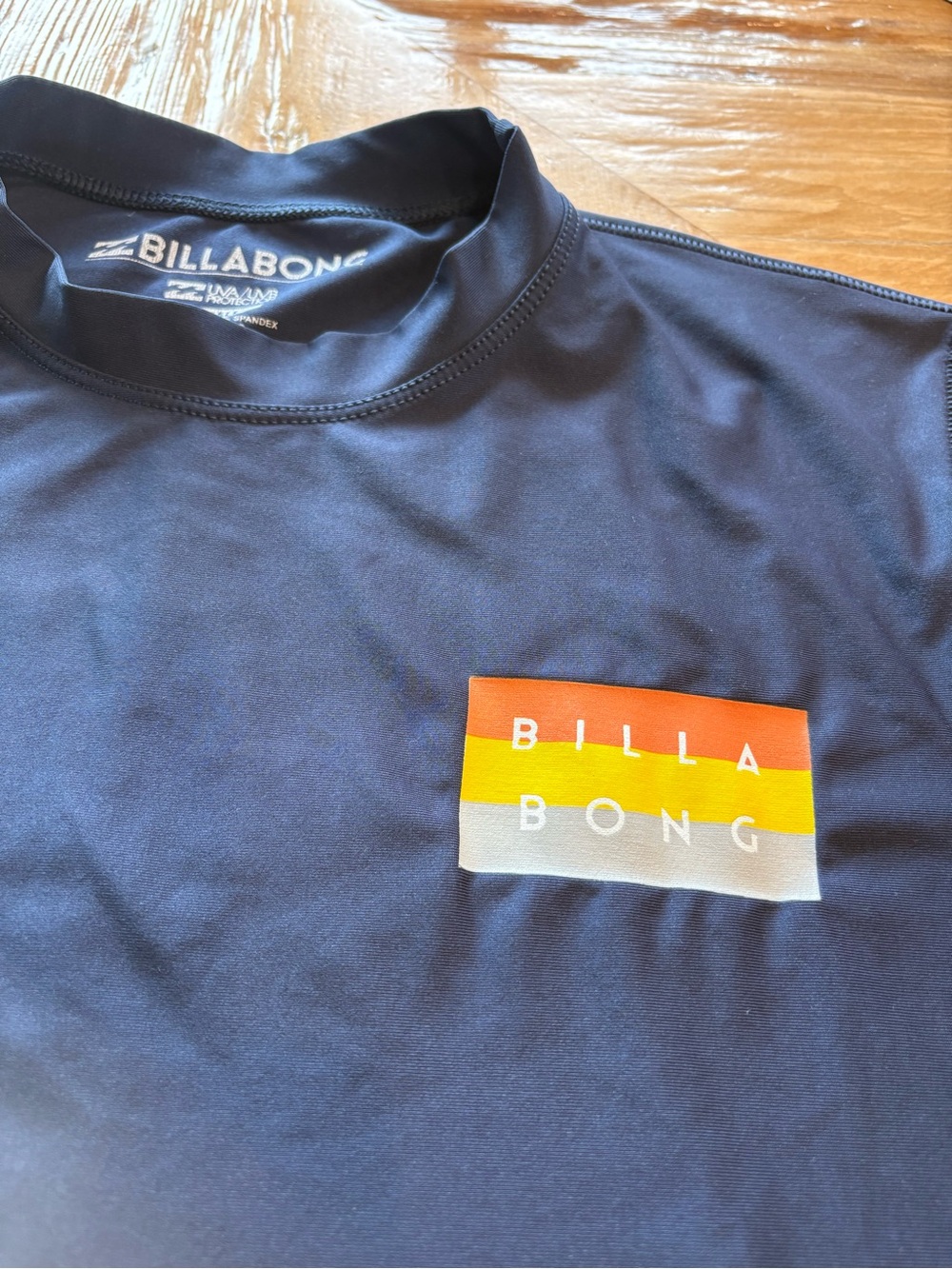 Billabong men’s Navy Rash Guard with Sunset Logo